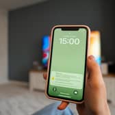 A file photo of a test of a public alert system on a mobile phone. Mobile phones will ring out with an alarm this September as the Government tests its emergency alert system.