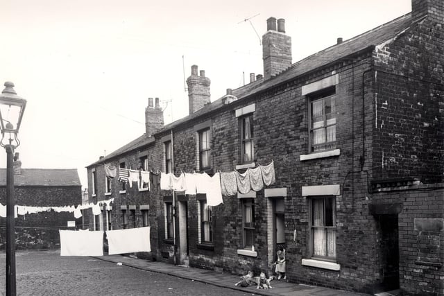 Woerth Street is at the end of the row, with building which fronts onto Alfred Cross Street. Pictured in July 1958.