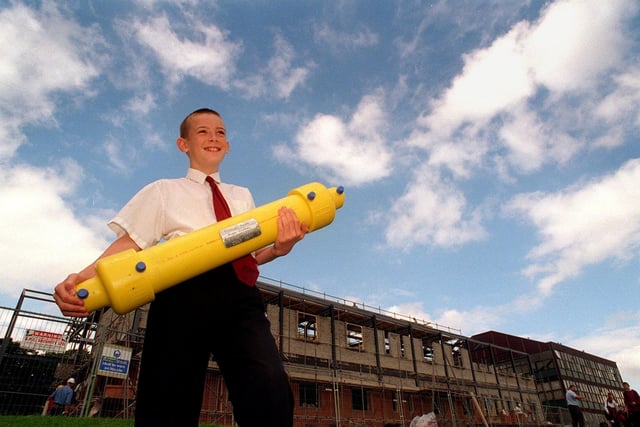 Farnley Park High was burying a time capsule to mark the completion of a new school building in July 1997. Pictured with the capsule in front of the new block is David Thompson.