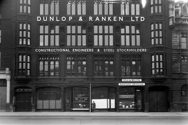 The south-west side of The Headrow showing Athenaeum House which was home to Dunlop and Ranken Ltd. engineers, Ellons Duplicator Co. Ltd., and T. Hamblin Ltd. opticians. Pictured in January 1950.