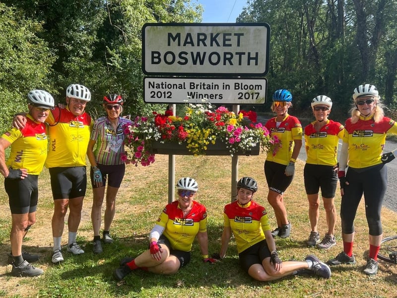 Cyclists in the picturesque Market Bosworth in Leicestershire.