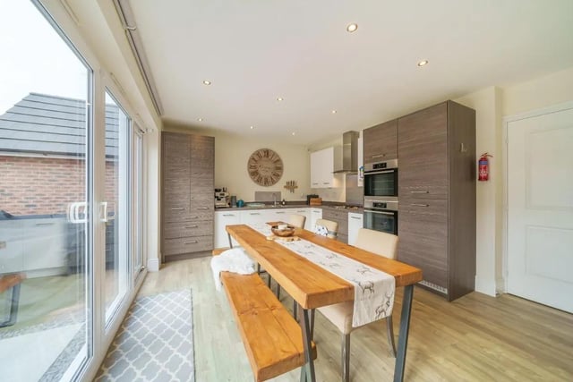 The open plan kitchen diner is the perfect space for entertaining and socialising.