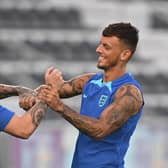 England's midfielder Kalvin Phillips (L) and England's defender Ben White take part in a  training session at the Al Wakrah SC Stadium in Al Wakrah, south of Doha, on November 20, 2022, on the eve of the Qatar 2022 World Cup football tournament Group B match between England and Iran. (Photo by Paul ELLIS / AFP) (Photo by PAUL ELLIS/AFP via Getty Images)
