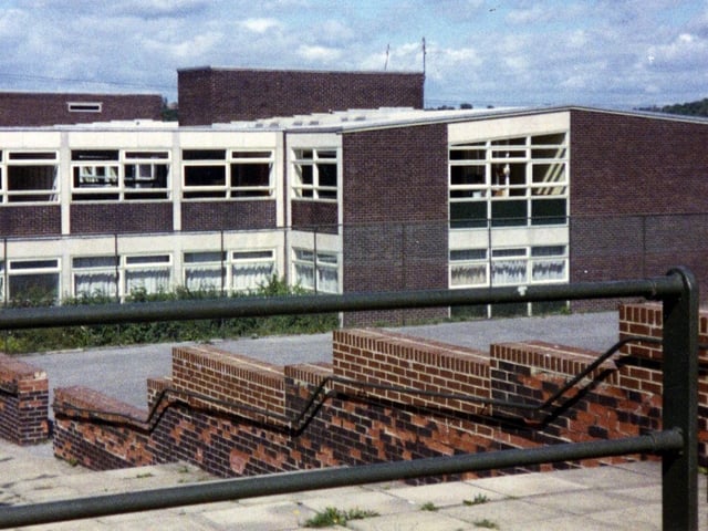 St Bendict's Roman Catholic School Secondary School pictured in August 1990 showing some of the classrooms and the top playground. It was sited in a corner of 13 acres of grounds, overlooking Kirkstall Abbey and Bramley Fall Woods.