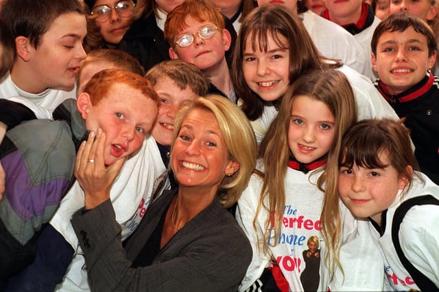 Gladiators host Ulrika Jonsson meets young fans after opening The Pocket Phone Shop at Crossgates Shopping Centre in January 1998.