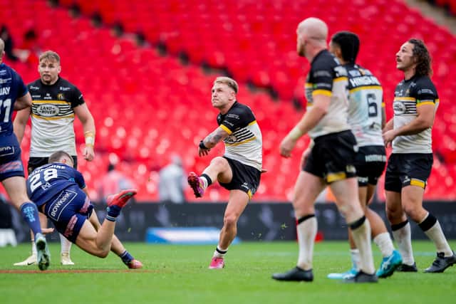 York Knights' Liam Harris kicks the game-winning golden-point drop goal against Featherstone Rovers in the 1895 Cup final at Wembley. Picture by Allan McKenzie/SWpix.com.