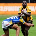 Muizz Mustapha is tackled by Kallum Watkins during Castleford Tigers' defeat to Leeds Rhinos at the Jungle in May. Picture by Alex Whitehead/SWpix.com.