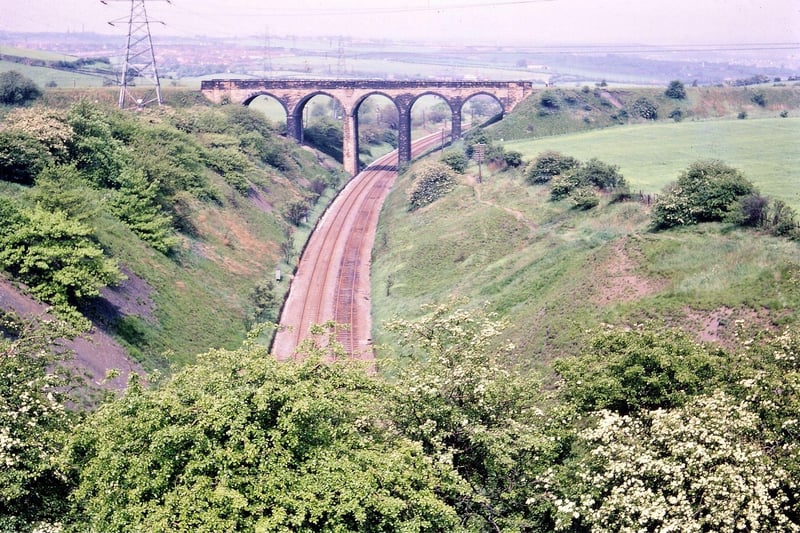 Dunningley Viaduct as seen from Thorpe Lane (A654) in May 1967 . The Viaduct crossed the Leeds to Wakefield line and connected Woodkirk to Beeston.