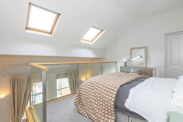 The second floor bedrooms have additional mezzanine areas. Jenna-Leigh Photography