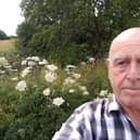 Michael Lowry said that he was worried about children or animals being burnt by the plants, pictured behind him in Cookridge, Leeds.