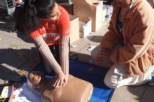 University of Leeds medical student Sachini Pattiya teaching CPR at today's event.