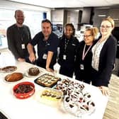 Employees at Lubrizol enjoy a bake sale to raise money for Happy Days Children's Charity.