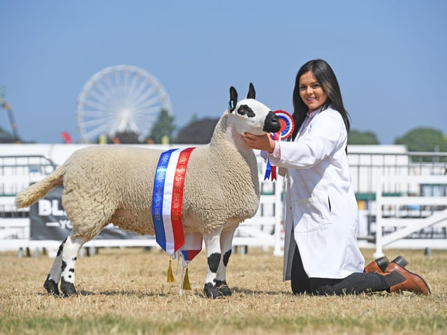 The Sheep Supreme Champion Ellie Owens celebrates her success with her Kerry Hill sheep from Woodhouse Farm in Herefordshire