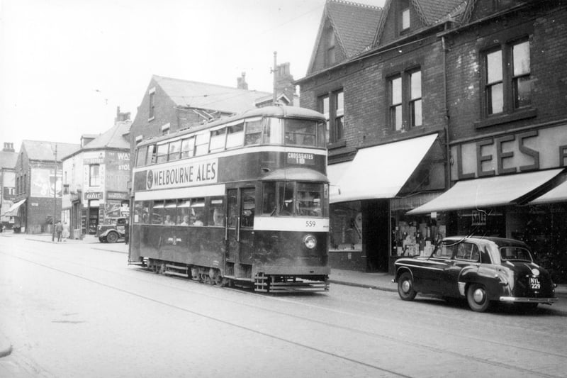 Tram No 559 travelling along Tong Road on route 18 to Cross Gates. Lees of Leeds shoe manufacturers can be seen on the right at 46a Tong Road. Pictured in September 1954.