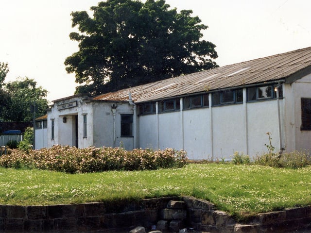 The old Rothwell Branch Library on Marsh Street. This prefabricated building was designed to be temporary when erected in 1952 but it continued to be used as a library until June 2001, when it was finally closed and subsequently demolished. A new library was built on the site, opening in March 2002.
