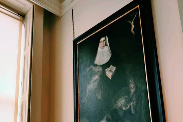 The Gascoigne Nun at Lotherton is a painting with a pair of spaniels that appear to be floating on the canvas