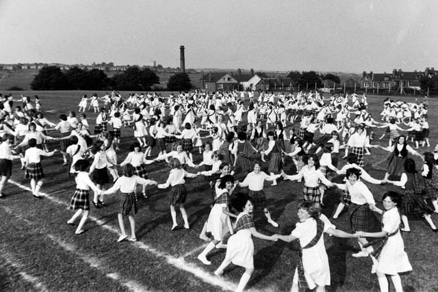July 1977 and schoolchildren rehearse a mass display of  Scottish dancing at Bedford Field Middle School ahead of a visit by The Queen.