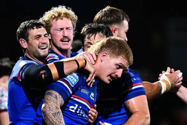 Wakefield celebrate Caius Faatili's try. (Photo: Olly Hassell/SWpix.com)