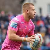 Mikey Lewis on the ball for Hull KR during their pre-season loss to Leeds Rhinos at AMT Headingley. Picture by John Clifton/SWpix.com.