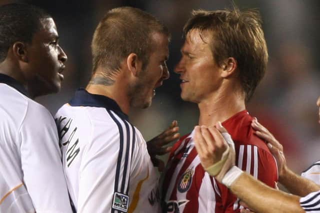 'JERK': Jesse Marsch, right, as a player, by his own admission, the now Leeds United boss pictured squaring up to David Beckham for Chivas USA against LA Galaxy back in August 2007. Photo by ROBYN BECK/AFP via Getty Images.