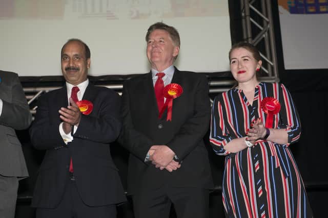 Coun Javaid Akhtar pictured alongside Gerry Harper and Kayleigh Brooks at the local election vote count at First Direct Arena in May 2018.