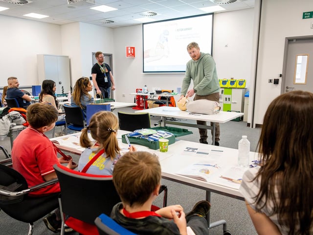 James Hassall teaching the first aid class