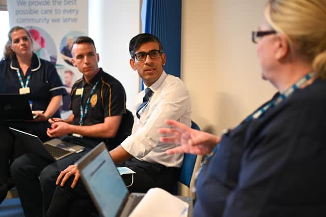 The Prime Minister meets with members of a multi-disciplinary team Victoria Tate (left), Andrew Merriman (2nd left) and Donna Pereira (right) who provide virtual care during a visit to the Rutland Lodge Healthcare Centre (Photo: Oli Scarff/PA Wire)