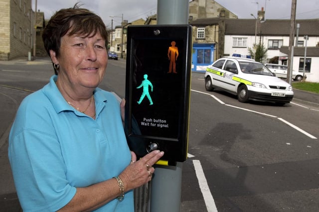 Campaigner Jean Thompson celebrates after a new pedestrian crossing was installed on Lowtown, Pudsey, to benefit pupils at the nearby Pudsey Lowtown School, on September 3, 2001.