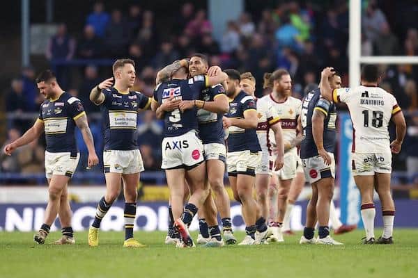 Rhinos celebrate their one-point win over Huddersfield in April. Picture by John Clifton/SWpix.com.