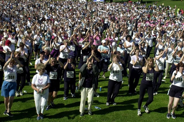 Participants pictured warming up for the Race For Life at Roundhay Park on May 12, 2002.