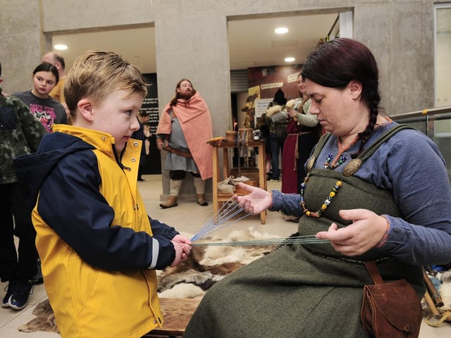 Kaiden Riggs, five of Roundhay helping Sif with craftwork.