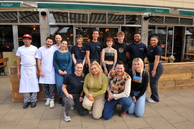 Staff pictured outside the new pizzeria