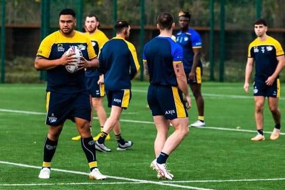 Sam Lisone (with ball) has completed a three-match ban and is available for Leeds Rhinos' Challenge Cup showdown with St Helens on Friday. Picture by James Hardisty.