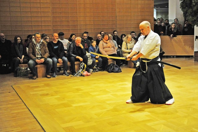 Keith Ducklin of the Live Interpretation team  demonstrates the Far East Batto-Jutsu Samurai Japanese sword technique.