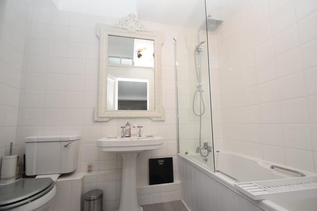 One of six bathrooms within the property.