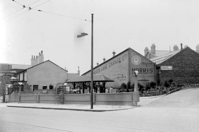 North Lane Garage shows Petrol Pumps on forecourt with track leading to workshop. Pictured in April 1937.