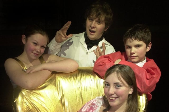 Students at Prince Henry's Grammar who were preparing to take to the stage for the school's production of Return to the Forbidden Planet in February 2002. Pictured, from left, are Keira Hollings, Jonnie Saunders, Jonathon Ward and Jenny Nevin.