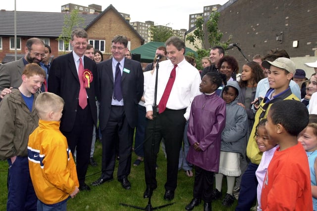 Prime Minister Tony Blair chats to youngsters before officially opening the Cromwell Mews development in June 2001.