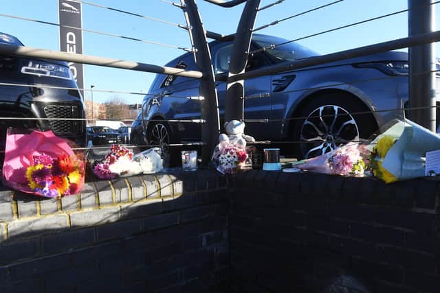 Flowers and Teddy bears at the scene of the fatal crash on Scott Hall Road, Leeds. Picture: Simon Hulme