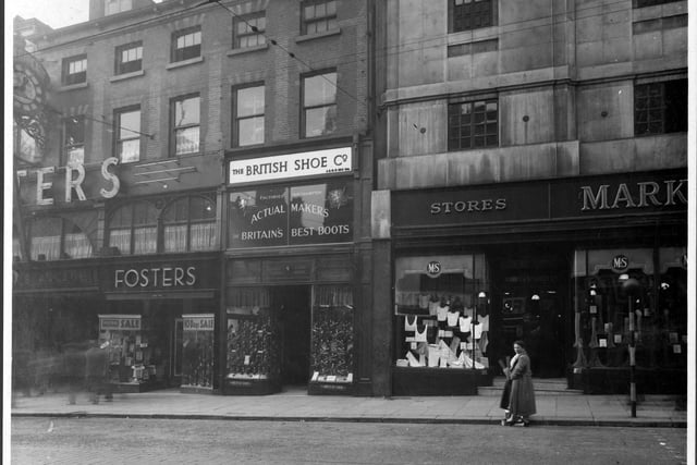 The Queens Arcade, built on the site of the Rose and Crown Hotel, in November 1937. In view is J.W. Foster, drapers, who are advertising a ten day sale. Also The British Shoe Company and Marks and Spencer, bazaar (before the move to its present site).