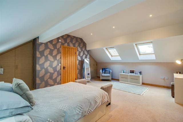 This bedroom has Velux windows bringing in plenty of natural light.
