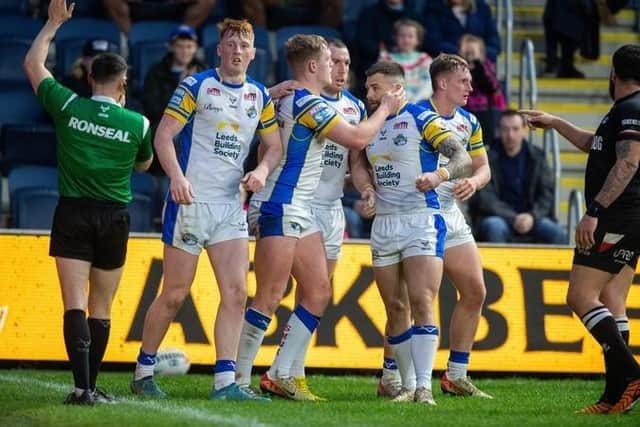 James McDonnell, second Rhinos player from left, celebrates after scoring against London Broncos. Picture by Bruce Rollinson.