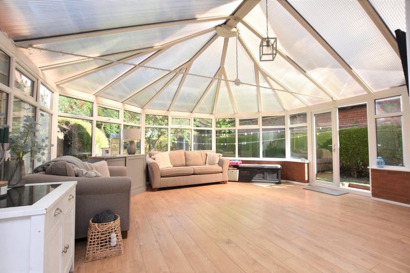 The very generous conservatory offers fantastic views of the garden
