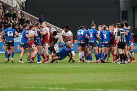 Players from both sides clash during Wakefield Trinity's Betfred Challenge Cup defeat by Wigan Warriors. Picture by Alex Whitehead/SWpix.com.