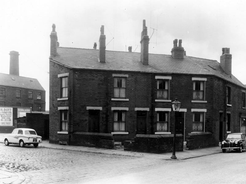 Nippet View in June 1960. On the left an old factory building can be seen, on the fence a poster 'H. Bott amd Sons Ltd, Sports Trousers manufacturers, Torre Road', An arrow points left 50 yards, 'Hands Wanted. Best Pay and Conditions'. Signs like this, advertising jobs in the tailoring industry would become increasingly rare.