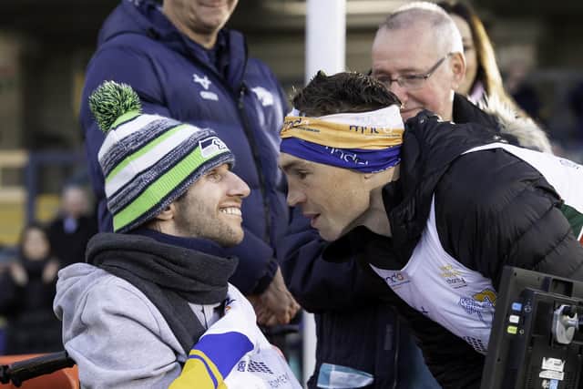 Leeds Rhinos and England legend Kevin Sinfield with former teammate Rob Burrow at AMT Headingley following his MND challenge in 2021. Picture by Allan McKenzie/SWpix.com.