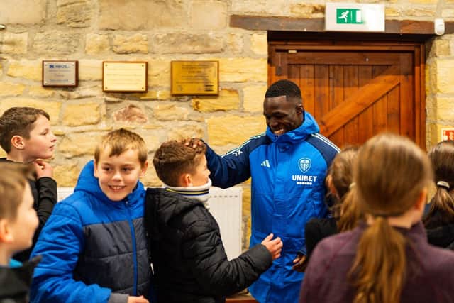 ALL SMILES - Leeds United wingers Willy Gnonto, pictured, and Crysencio Summerville paid a visit to children staying at the Leeds Children's Charity at Lineham Farm