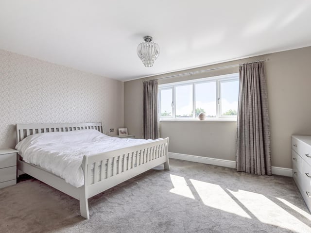 Upstairs there are four double bedrooms and two bathrooms.