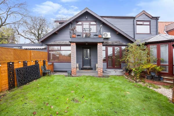 The front garden and approach to the four bedroom property.
