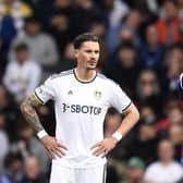 RALLYING CALL: From Leeds United's German defender Robin Koch, left, pictured after Crystal Palace had gone 4-1 up at Elland Road through French striker Odsonne Edouard, right. Photo by OLI SCARFF/AFP via Getty Images.